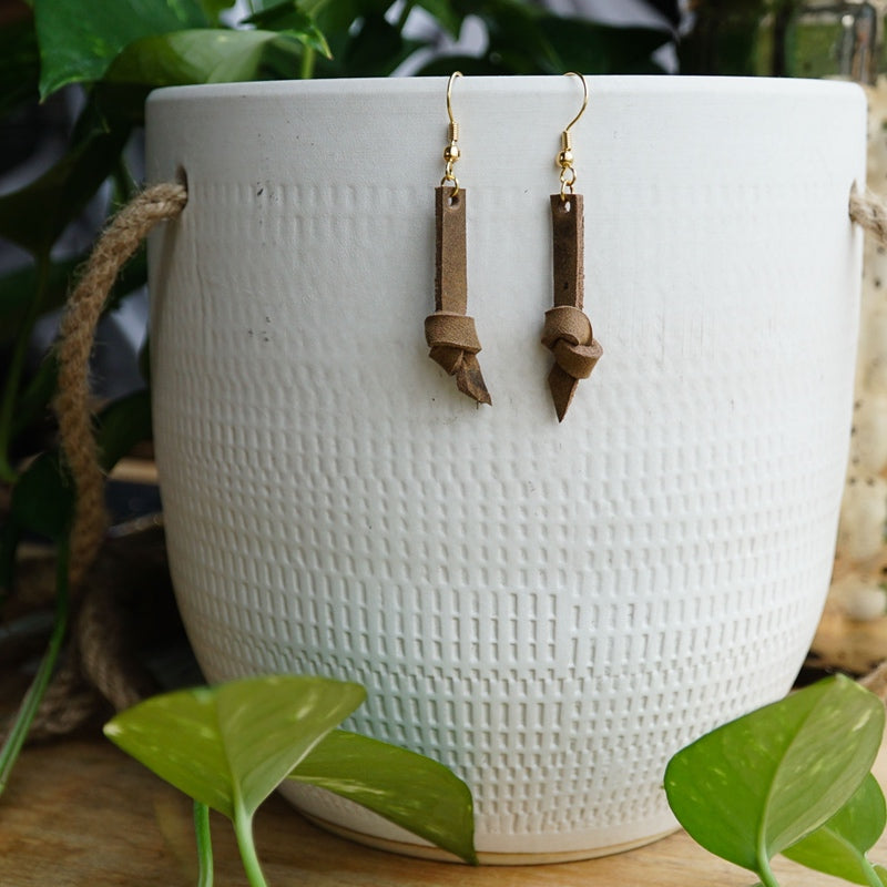 Knotted top leather earrings